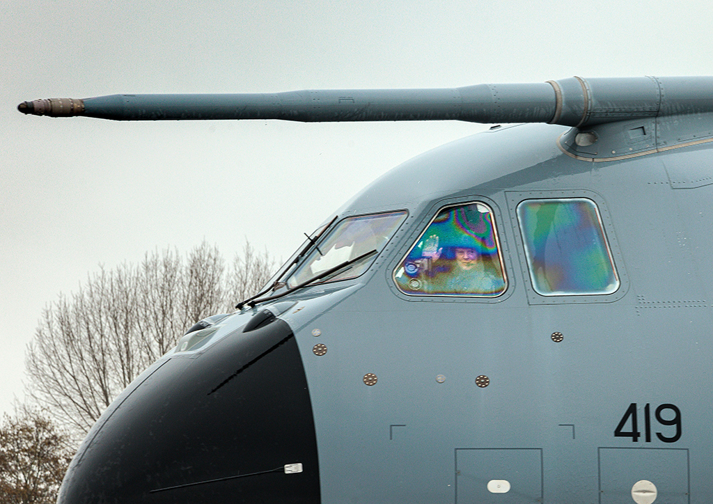 Flight Lieutenant Dunc Wright waving from the Captains seat of an Atlas (A400M) aircraft after returning from his final sortie.